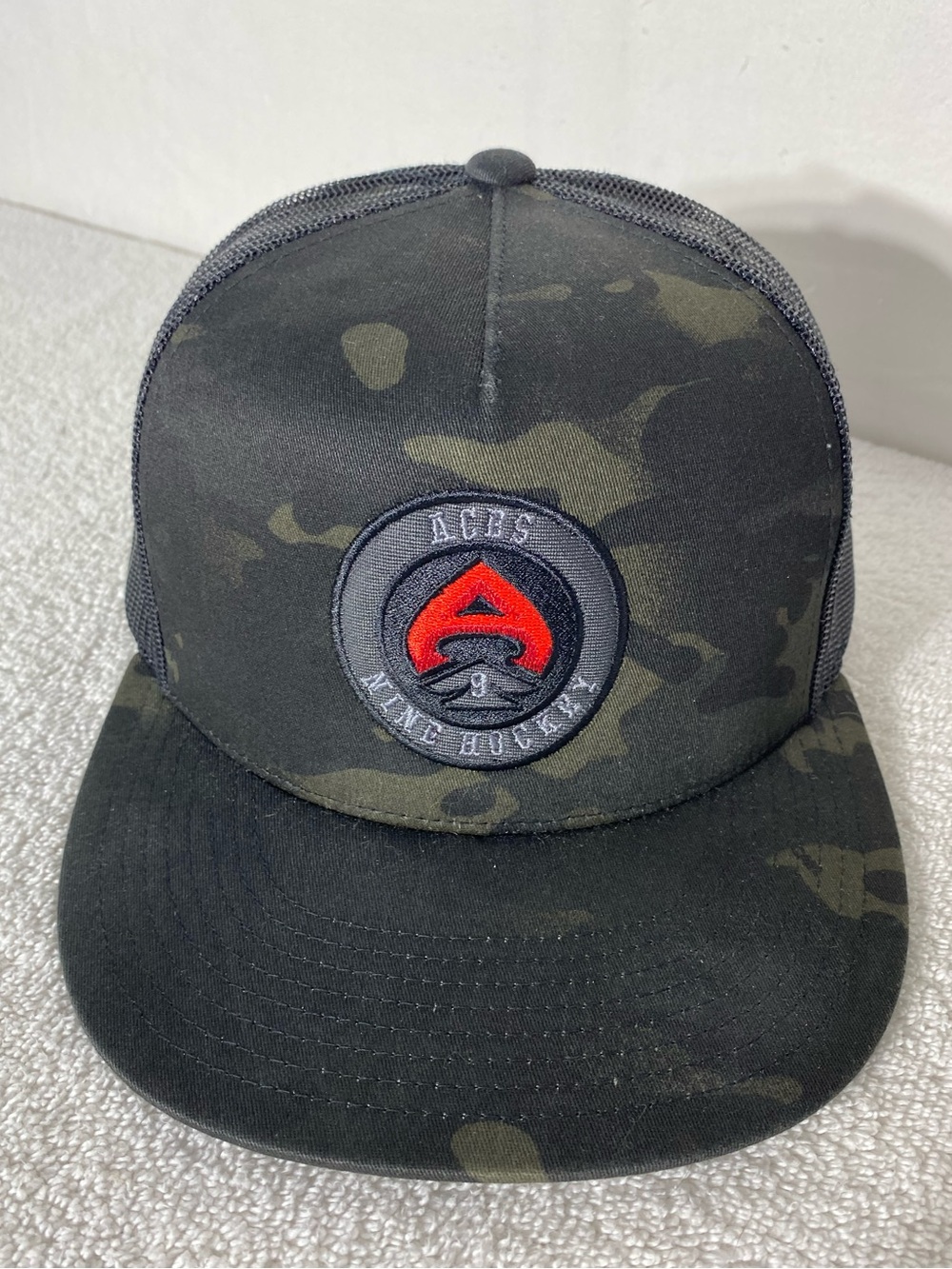 Aces Nine Hockey Black Green Camo Mesh Back Snap Back Trucker Hat